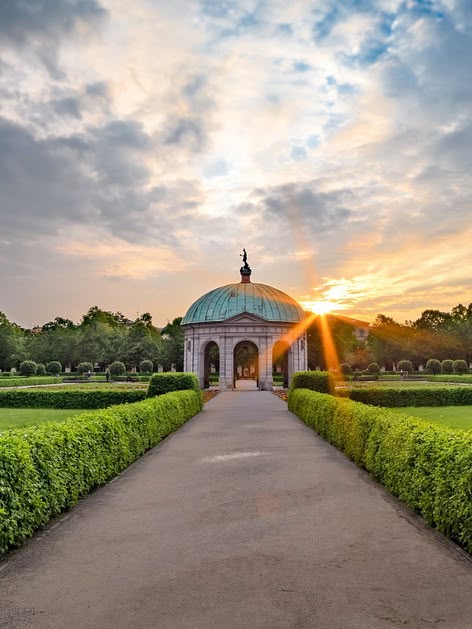 Sunrise over the Diana Temple in the Hofgarten, a historic garden in Munich, Germany.